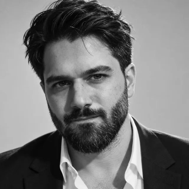Black-and-white portrait of Mad Prompter